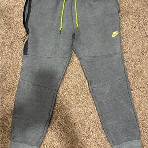 Nike  Tech gray joggers with Neon Accents